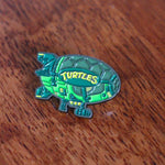 Ninja turtle blimp enamel pin